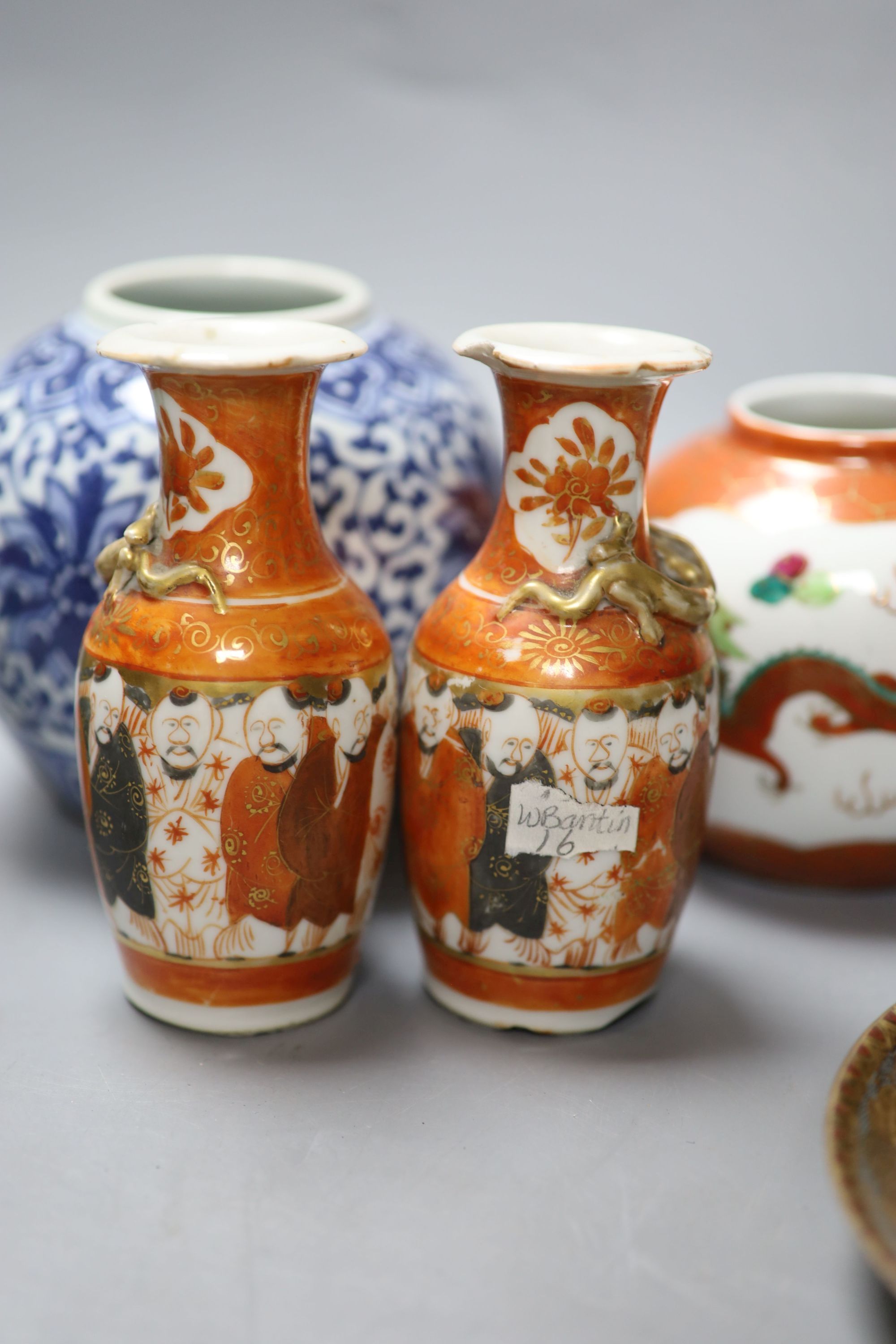 A group of Chinese and Japanese ceramics and three cloisonne enamel vases